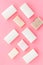 Soap bars flat lay on pink background top-down pattern