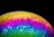 Soap bubble on a dark background lots of amazing colors