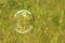 Soap bubble flying in the air