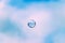 Soap bubbles floating in a blue sky background