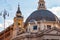 Soap bubbles flying on Piazza del Popolo, People Square in Rome surrounded by ancient churches like Santa Maria in Montesanto with