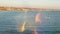 Soap bubbles on pier in California, blurred summertime seamless looped background. Creative romantic metaphor, concept