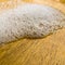 Soap bubbles on a wooden countertop.