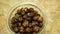 Soap nuts Indian soapberry or washnut glass jar cup, Sapindus mukorossi reetha or ritha from the soap tree shells are