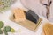 Soaps and other beauty care products on a white table in the bathroom