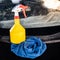 Soapy foggy spray bottle with rag. Cleaning tool for car wash