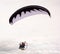 Soaring over the sea in a motorized paraglider