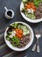 Soba noodles buddha bowl. Buckwheat noodles with vegetables on a dark background, top view. Vegetarian healthy food