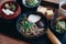 Soba noodles with soup on wooden tray