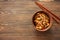 Soba noodles , vegetables and seafood in clay pot