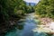 Soca - Scenic view of green hills and Soca river in Bovec, Triglav National Park, Slovenia