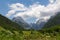 Soca - Scenic view of mount Mangart and Jalovec in Log pod Mangartom in Julian Alps, Slovenia