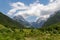 Soca - Scenic view of mount Mangart and Jalovec in Log pod Mangartom in Julian Alps, Slovenia