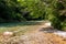 Soca - Turquoise creek of Soca river in Bovec, Triglav National Park, Slovenia