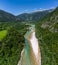 Soca Valley, Slovenia - Aerial panoramic view of the emerald alpine river Soca on a bright sunny summer day with Julian Alps