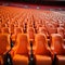 Soccer anticipation Empty orange seats await fans at stadium rows