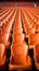 Soccer anticipation Empty orange seats await fans at stadium rows