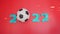 soccer ball 2022 with sparklers. Figures with football ball Happy New Year. football card red background. Blue numbers