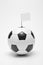 Soccer ball (black/white) with blank flag, sports