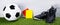 Soccer ball, boots, penalty cards for the referee, lie on the grass, on a gray background