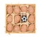 Soccer ball and eggs in a wooden box