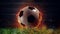 Soccer ball in flame goes fast to the stadium field