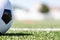 Soccer ball on grass with shadow