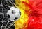 Soccer ball in the grid portal, Belgium. abstract colors of the Belgian flag.