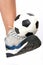 Soccer ball on rubber shoes