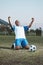 Soccer ball, sports and man celebrate goal on field for competition, fitness or training outdoor. Black male athlete