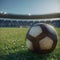 soccer ball, stadium in the background