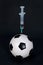 Soccer ball and syringe