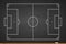 Soccer field chalked on blackboard. Football stadium on board. Background of painted chalk sketch line. Overhead view. Chalkboard