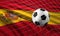 Soccer football ball and flag of Spain with goal at soccer net 3