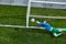 Soccer football goalkeeper making diving save