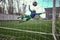 Soccer football goalkeeper making diving save