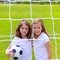 Soccer football kid girls playing on field