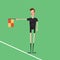 Soccer / Football referee linesman showing offside. Checkbox in hand