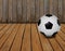 Soccer football and wood texture background