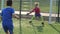 Soccer forward dribbling ball and scoring goal