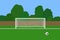 Soccer goal and ball on football stadium. Association football goal posts with net standing on a outdoor sports field