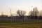 Soccer goal on an empty field in the evening sun