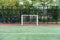 Soccer goal with net in rubber field