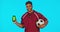 Soccer man, green screen and phone in studio with smile, sports mockup or happiness for fitness. Football coach