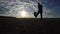 Soccer. Man is stuffing a football soccer ball silhouette sport at sunset football freestyle