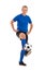 Soccer player in blue uniform making trick with ball isolated on