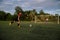 Soccer player hits the ball. Football player kicking penalty