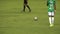 Soccer Player Kicks Ball
