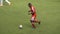 Soccer Player Kicks Ball in Slow Motion