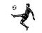 Soccer player silhouette  kicking the ball in the air and going to pass or strike a goal.